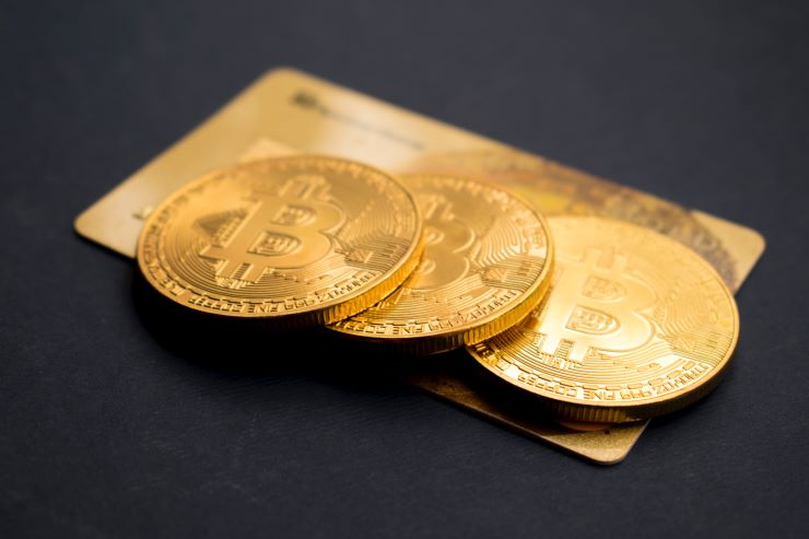 Bitcoins and a gold Card