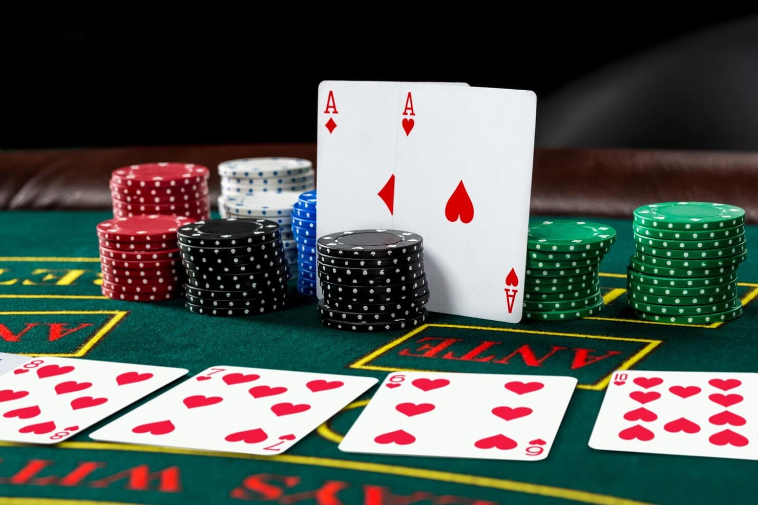 poker-play-chips-cards-green-table_639032-1474.jpeg