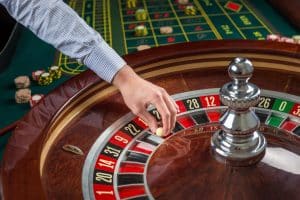 roulette wheel croupier hand with white ball casino close up details 639032 945
